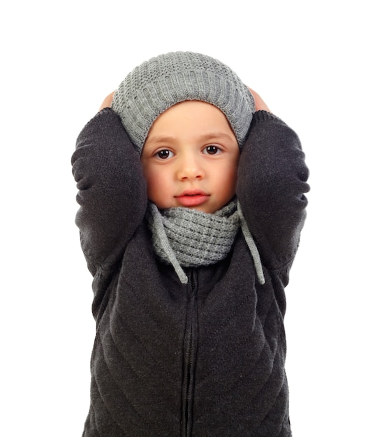 Beautiful child with wool scarf and coat