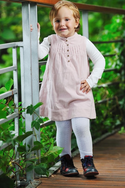 beautiful children  posing in fashionable clothing outdoor