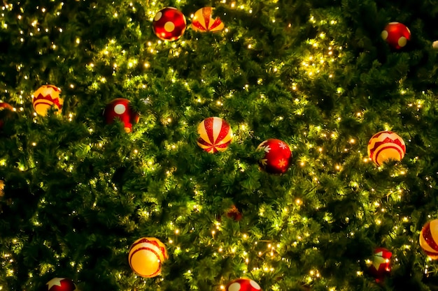 beautiful Christmas ball decor on tree and light up