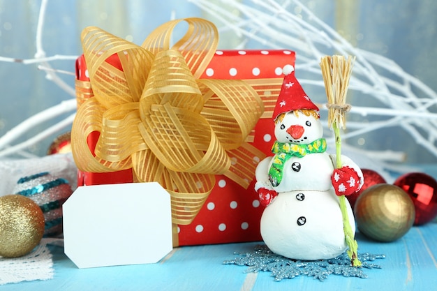 Beautiful Christmas composition with gift and Christmas toys close-up