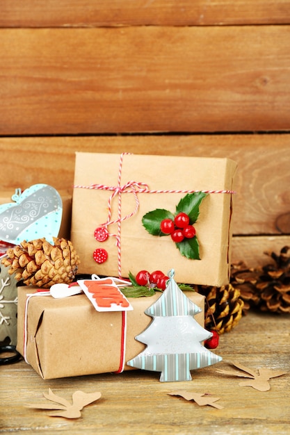 Beautiful Christmas composition with handmade gifts on wooden background