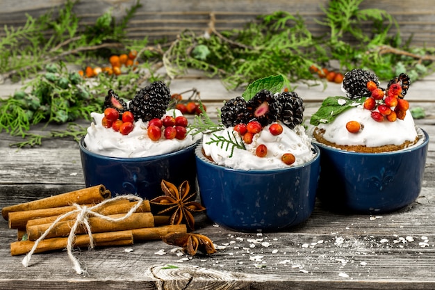 beautiful Christmas cupcake with cream and berry