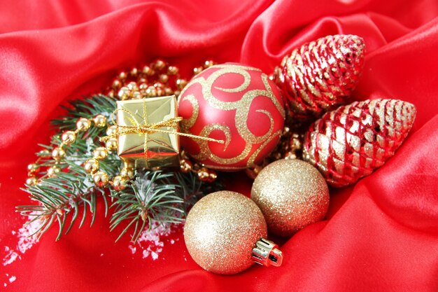 Beautiful Christmas decor on red satin cloth