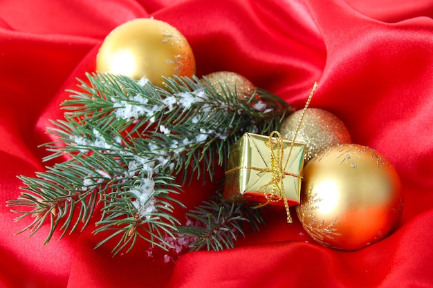 Beautiful Christmas decor on red satin cloth