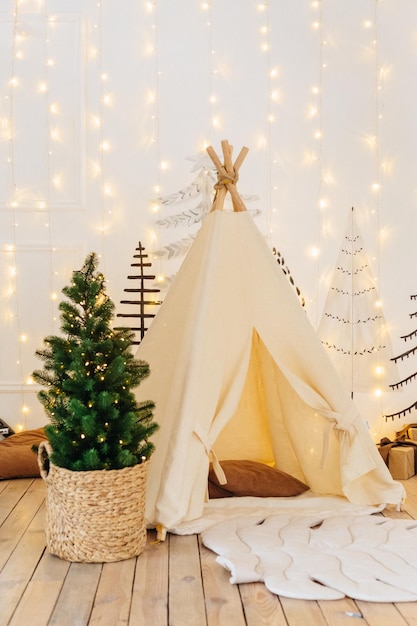 beautiful Christmas decorations and gifts under the Christmas tree