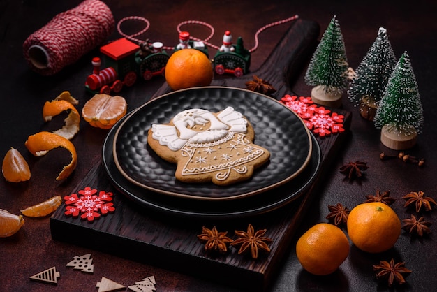 Beautiful Christmas decorations with holiday toys clementines and gingerbread