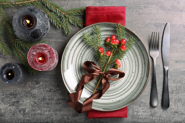 Beautiful Christmas table setting on wooden background