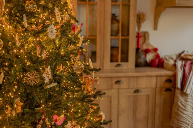 Beautiful christmas tree with gifts in the interior