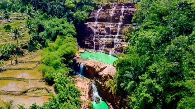 Beautiful Cigangsa waterfall near farmland