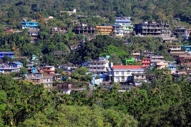 Beautiful city houses or building on the mountain or hill valley.