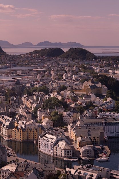 Beautiful city of Ålesund an its fiord in the Møre og Romsdal County, Norway. It is part of the traditional district of Sunnmøre and the centre of the Ålesund Region.