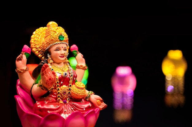 Beautiful Clay Idol of Hindu Goddess Lakshmi for diwali festival.