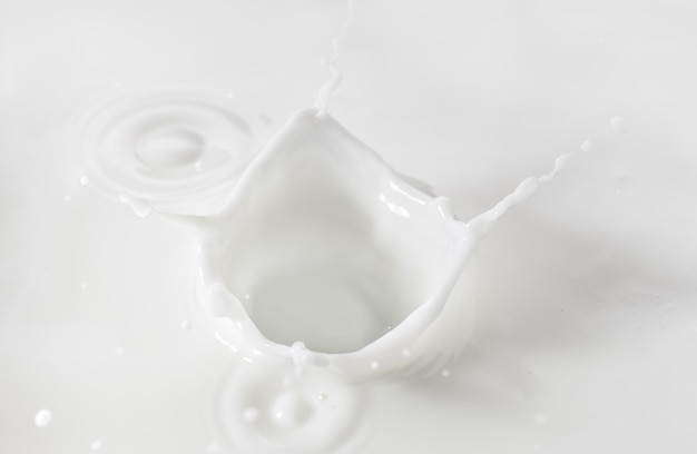 Beautiful close-up splash of milk