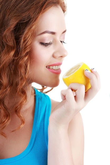 Beautiful closeup young woman with lemons.