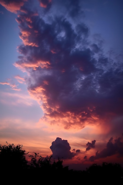 Beautiful clouds at sunset at skyscraper purple sunset and silhouetted clouds