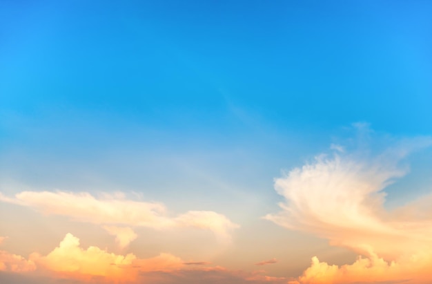 Beautiful cloudscape with blue sky and fluffy clouds at sunset