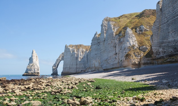 Beautiful coastline and alabaster cliff bay of Etretat, France