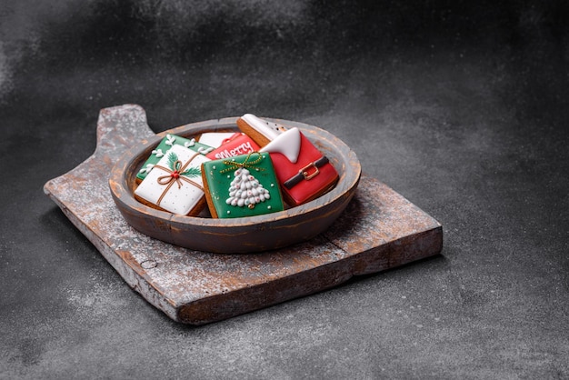 Beautiful colored Christmas gingerbread cookies for the design and decoration