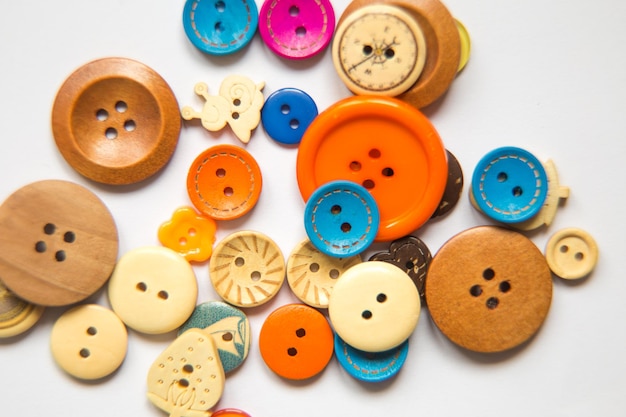 Beautiful colorful buttons on a white background beautiful handcraft composition