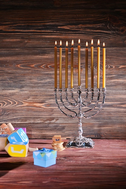 Beautiful composition for Hanukkah on wooden table