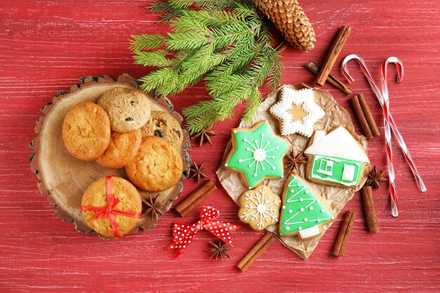 Beautiful composition with Christmas cookies on wooden background