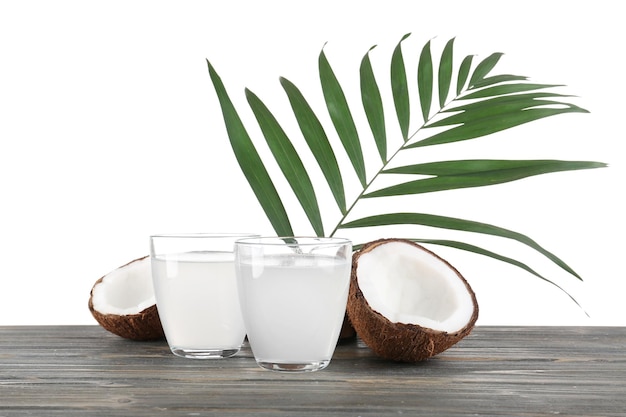 beautiful composition with coconut water on white background