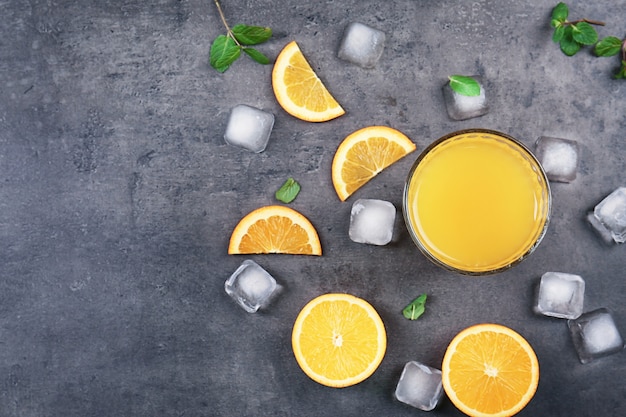 Beautiful composition with fresh orange juice on table, top view