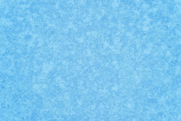 Beautiful contrasting white and blue background of ice texture with a beautiful pattern of frozen veins winter background