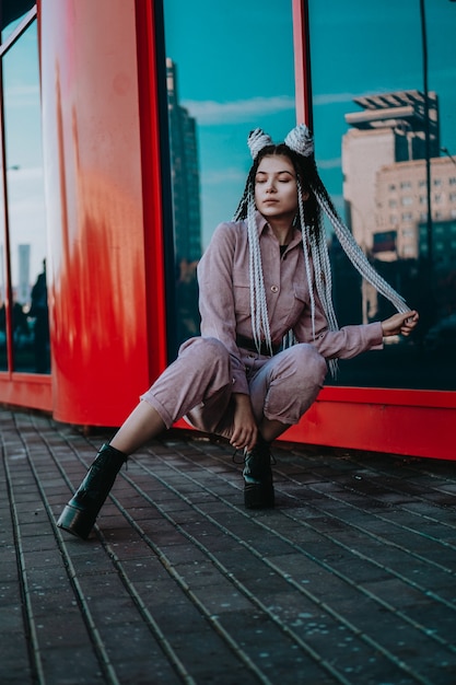 Beautiful cool girl with dreadlocks