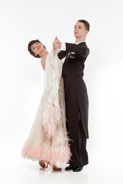 Beautiful couple in the active ballroom dance