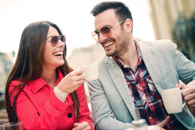 Beautiful couple having coffee on a date