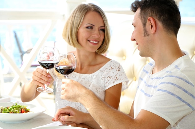 Beautiful couple having  romantic dinner at restaurant