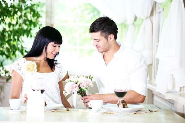 Beautiful couple having  romantic dinner at restaurant