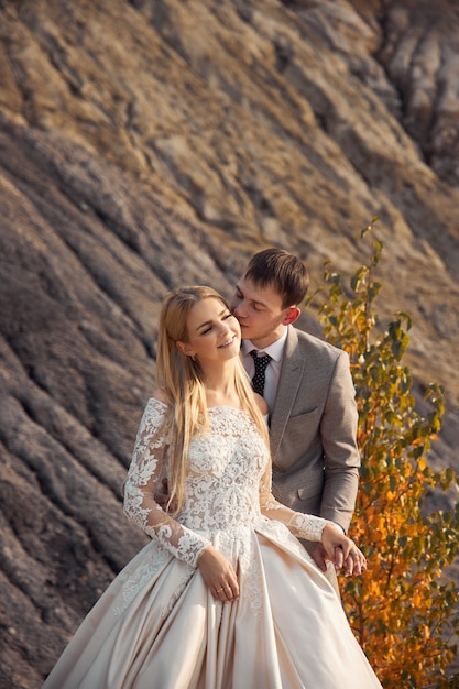 Beautiful couple in love on a fabulous landscape