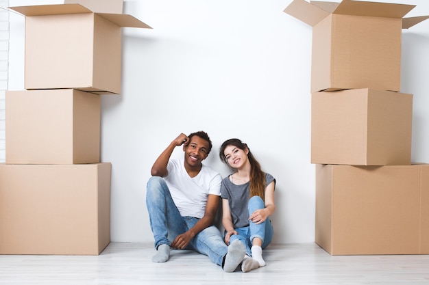 Beautiful couple moving into a new house