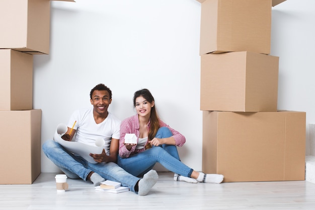 Beautiful couple moving into a new house