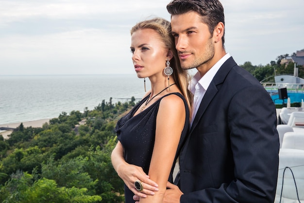 Beautiful couple standing outdoors