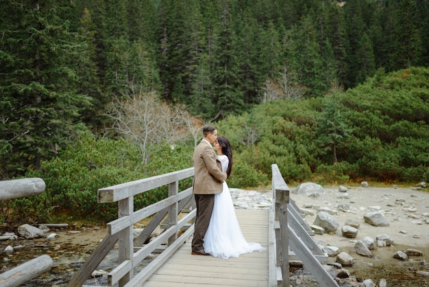 Beautiful couple walking among rocks