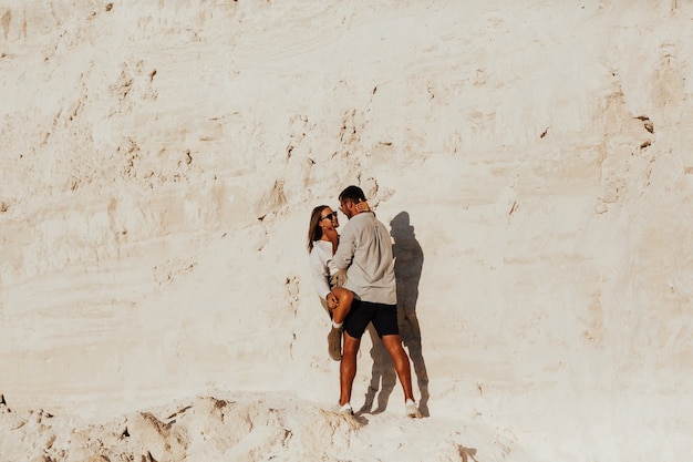 Beautiful couple on the white rocks