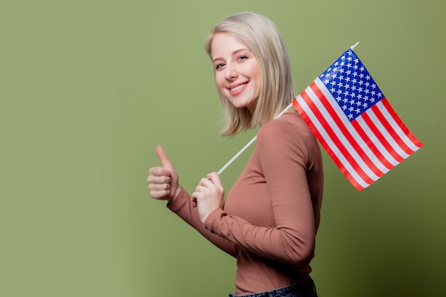 Photo beautiful cowgirl with united states of america flag