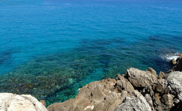 Beautiful crystal clear sea water and beach in Sardinia island Sardegna Italy