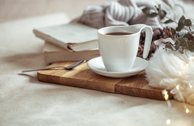 A beautiful cup of hot drink among the home decor details.