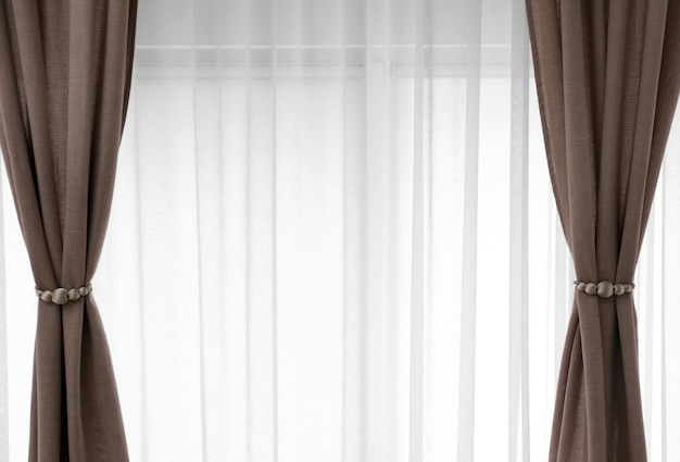 Beautiful curtains with tiebacks indoors