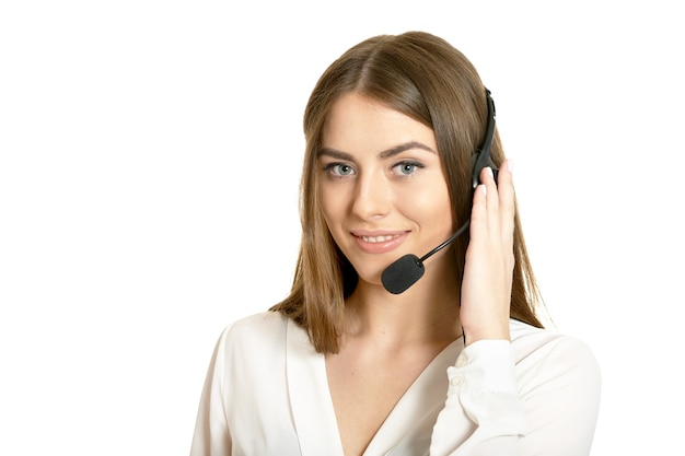 Beautiful customer service operator woman with headset, isolated on white background