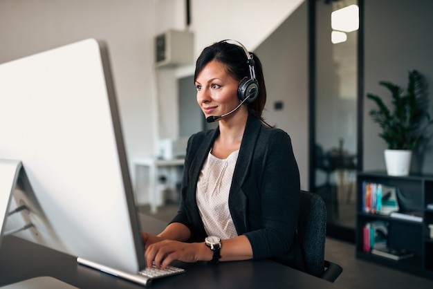 Beautiful customer service representative at work.