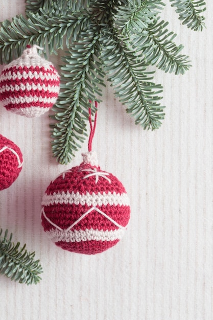 Beautiful cute crocheted christmas balls for decoration with copyspace