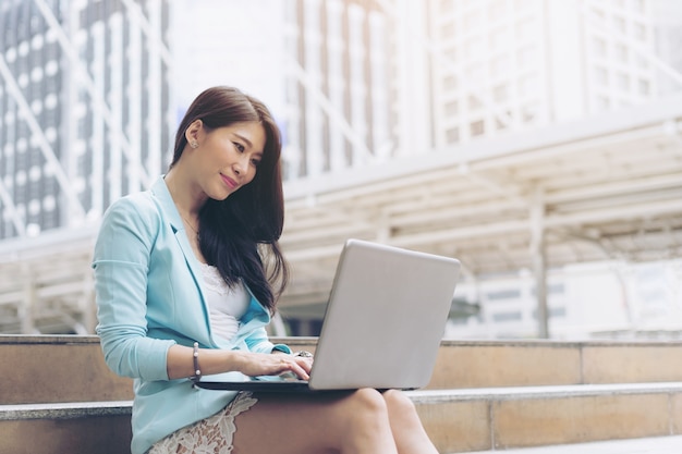 Beautiful cute girl smiling in business woman clothes  