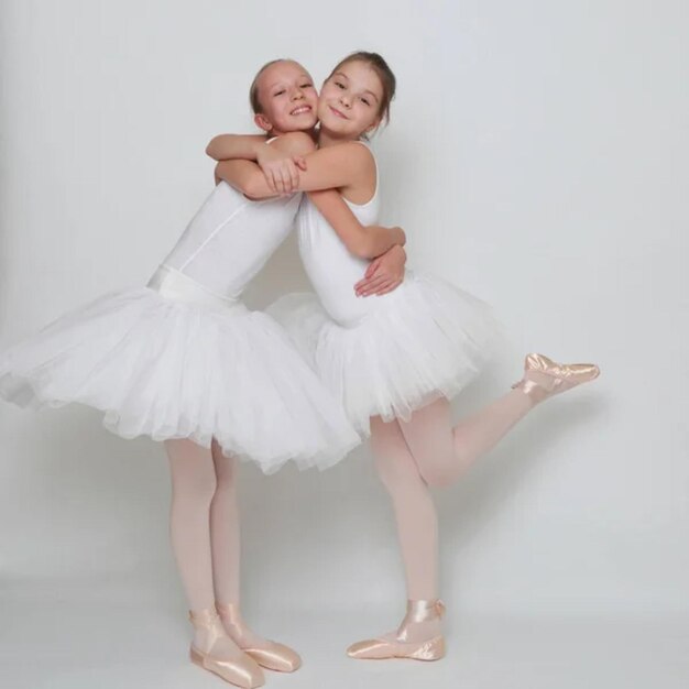 Beautiful dancers posing in studio