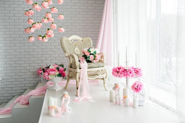 Beautiful decor of candles and flowers. White Pink shades.