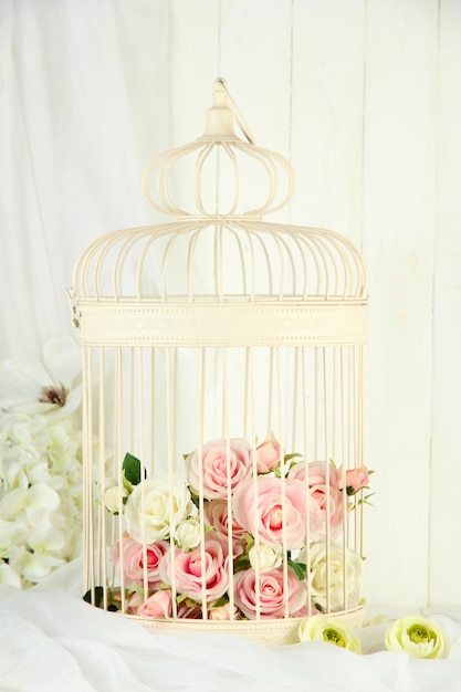 Beautiful decorative cage with beautiful flowers